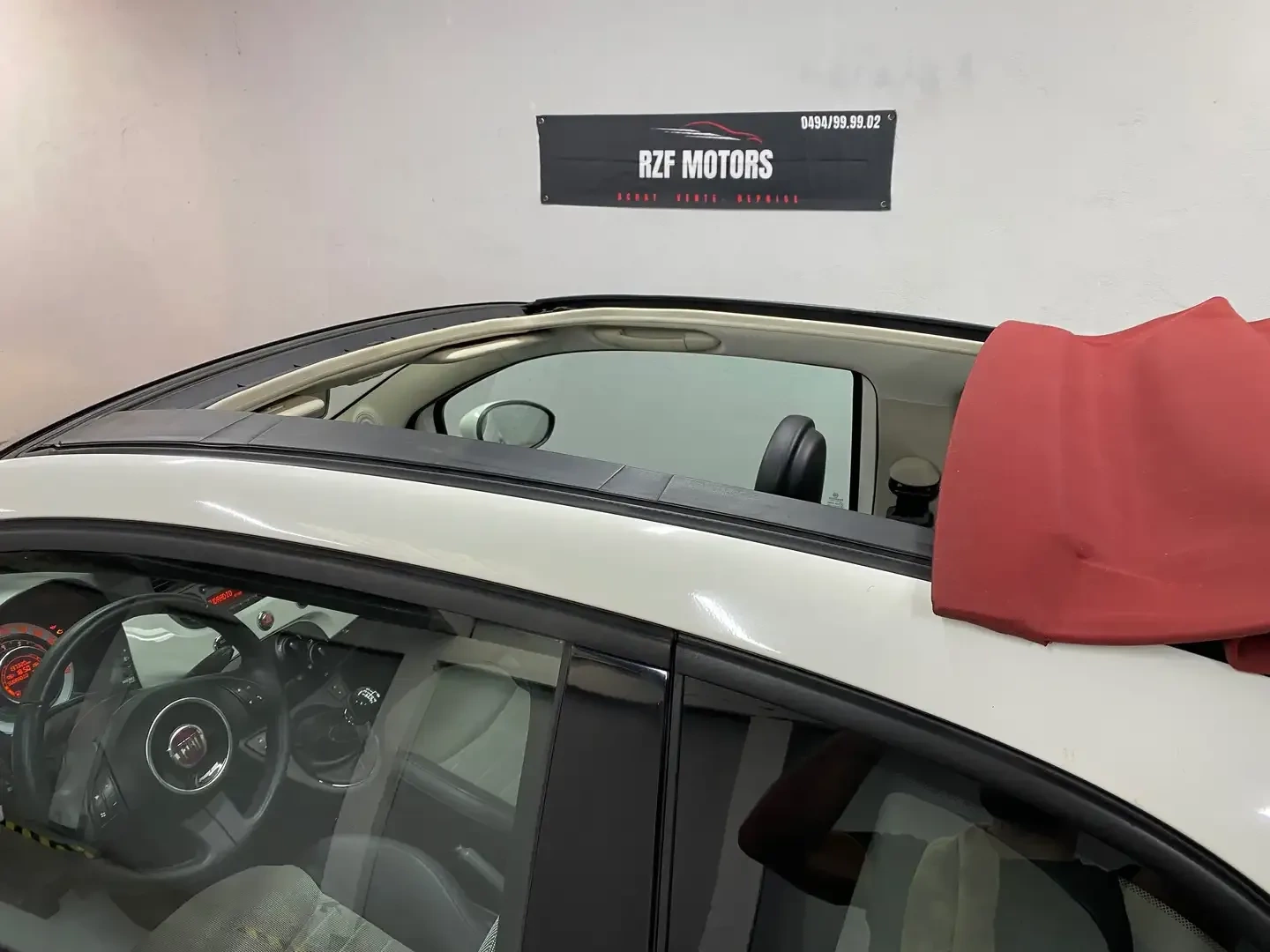 Vue 11 — Véhicule d’occasion Fiat 500C Lounge 2011