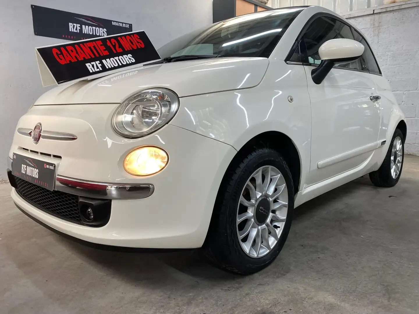 Vue 10 — Véhicule d’occasion Fiat 500C Lounge 2011