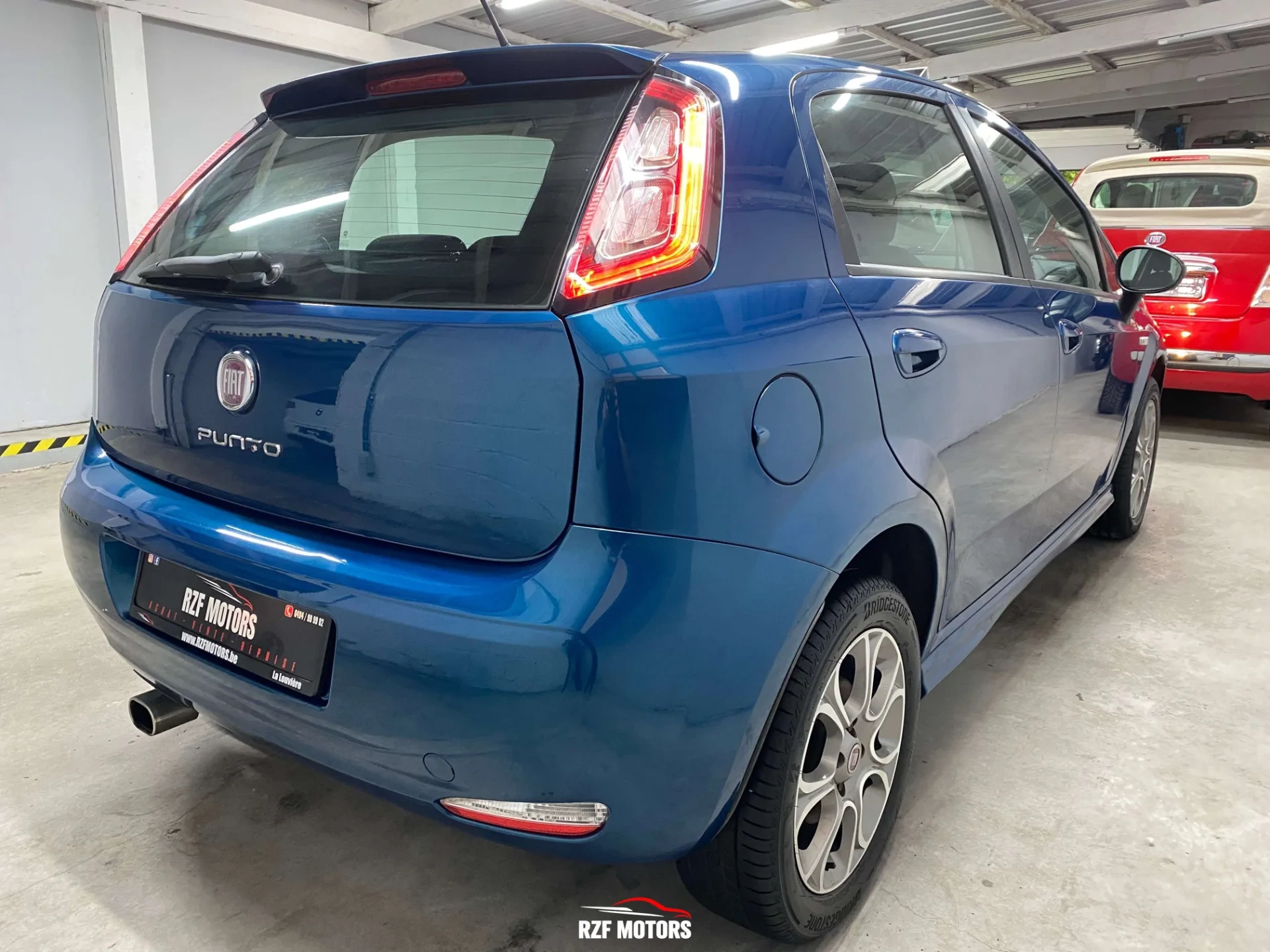 Vue 4 — Véhicule d’occasion Fiat Punto Sport 2012