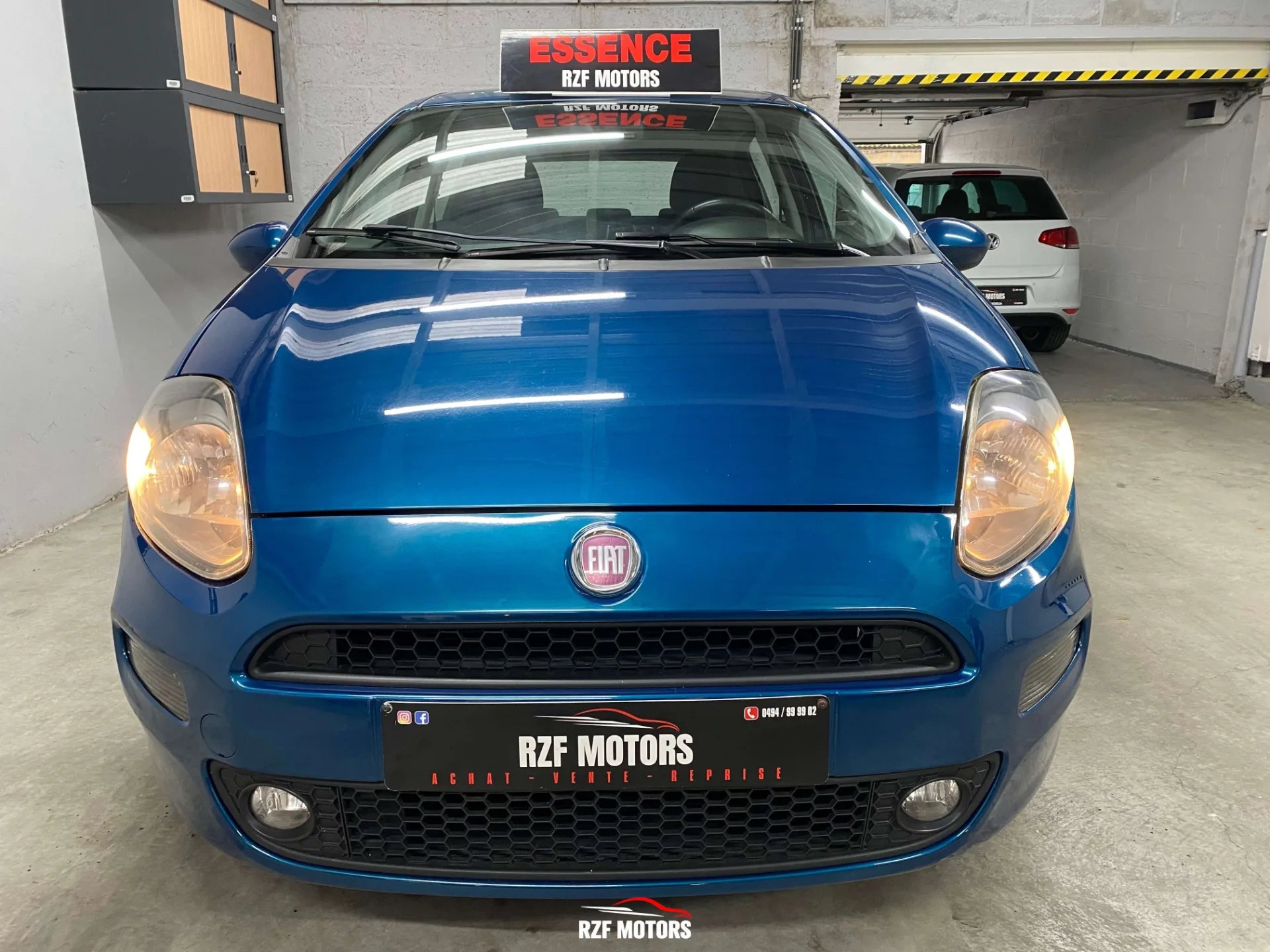 Vue 2 — Véhicule d’occasion Fiat Punto Sport 2012